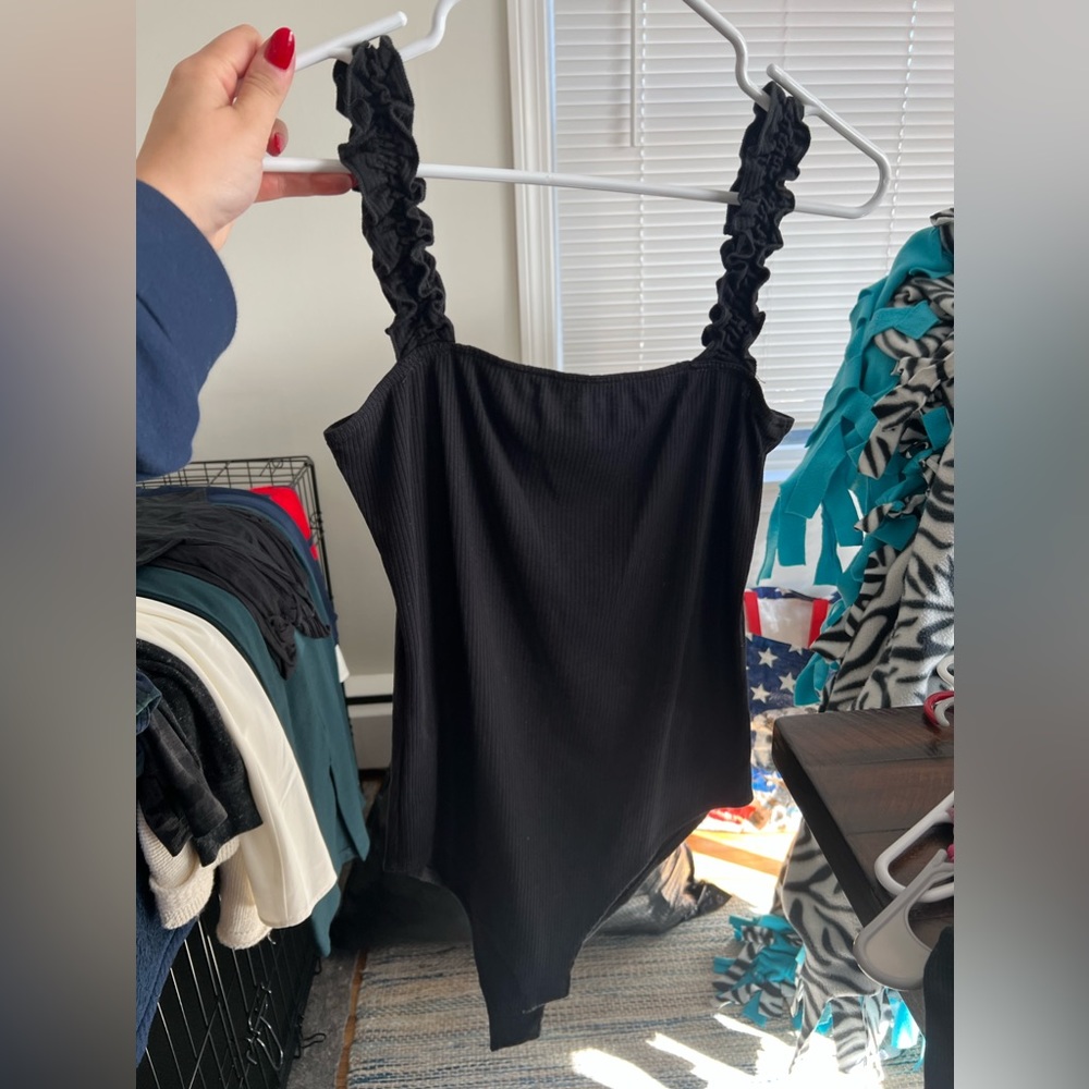 Black ripped bodysuit